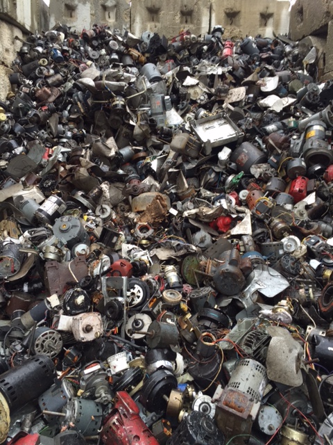 pile of scrap electric motors